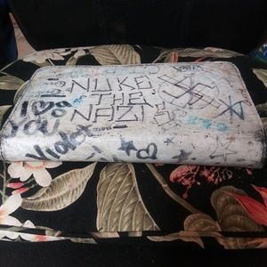 Personal punk CD album collection in leather case